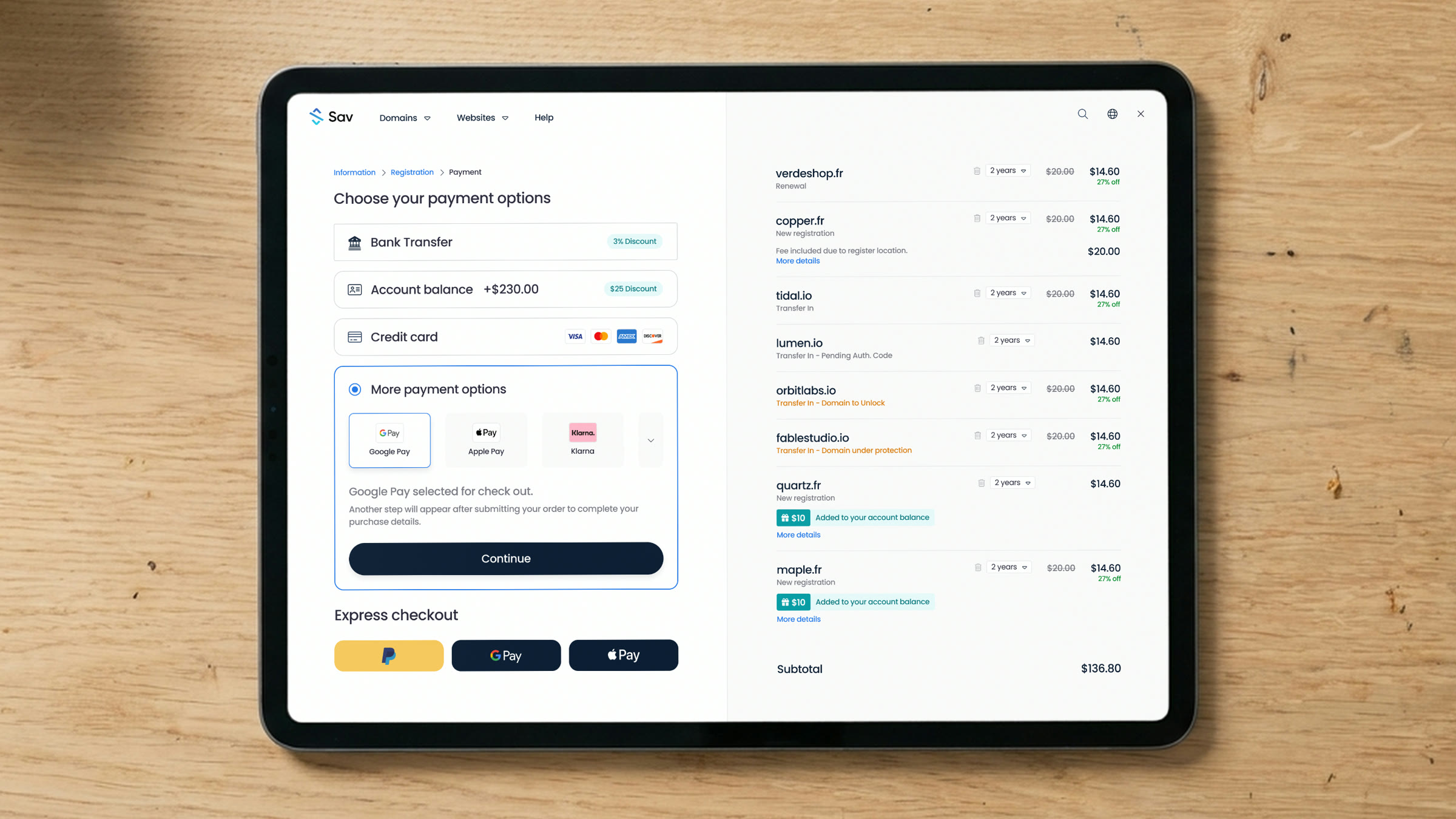 Sav's checkout on a tablet: payment options beside the cart of domains